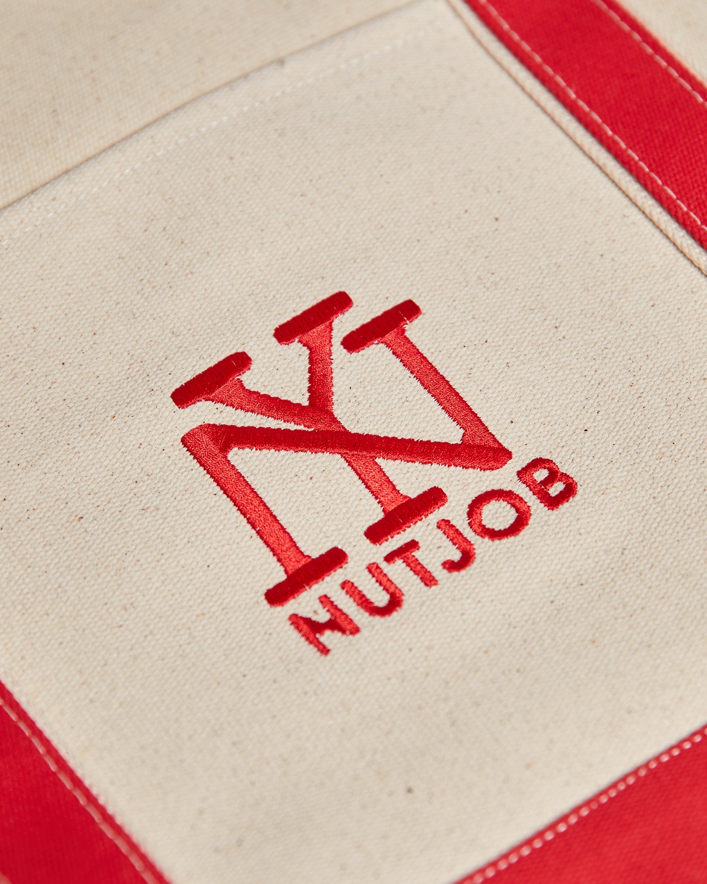 Red Heavy Duty Canvas tote with embroidered NEW YORK NUTJOB logo