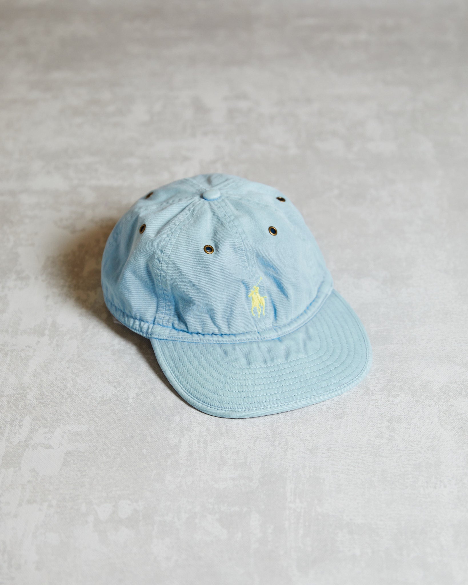 Vintage Polo Ralph Lauren Soft Brim 6 panel hat with a yellow logo